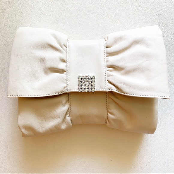 Banana Republic Handbags - Banana Republic - Leather Bow Clutch Cream
